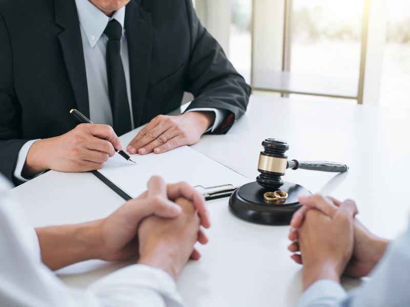 Divorce attorney meeting with clients